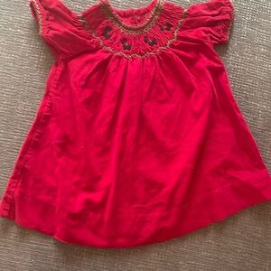 Baby’s Red corduroy Christmas dress.
